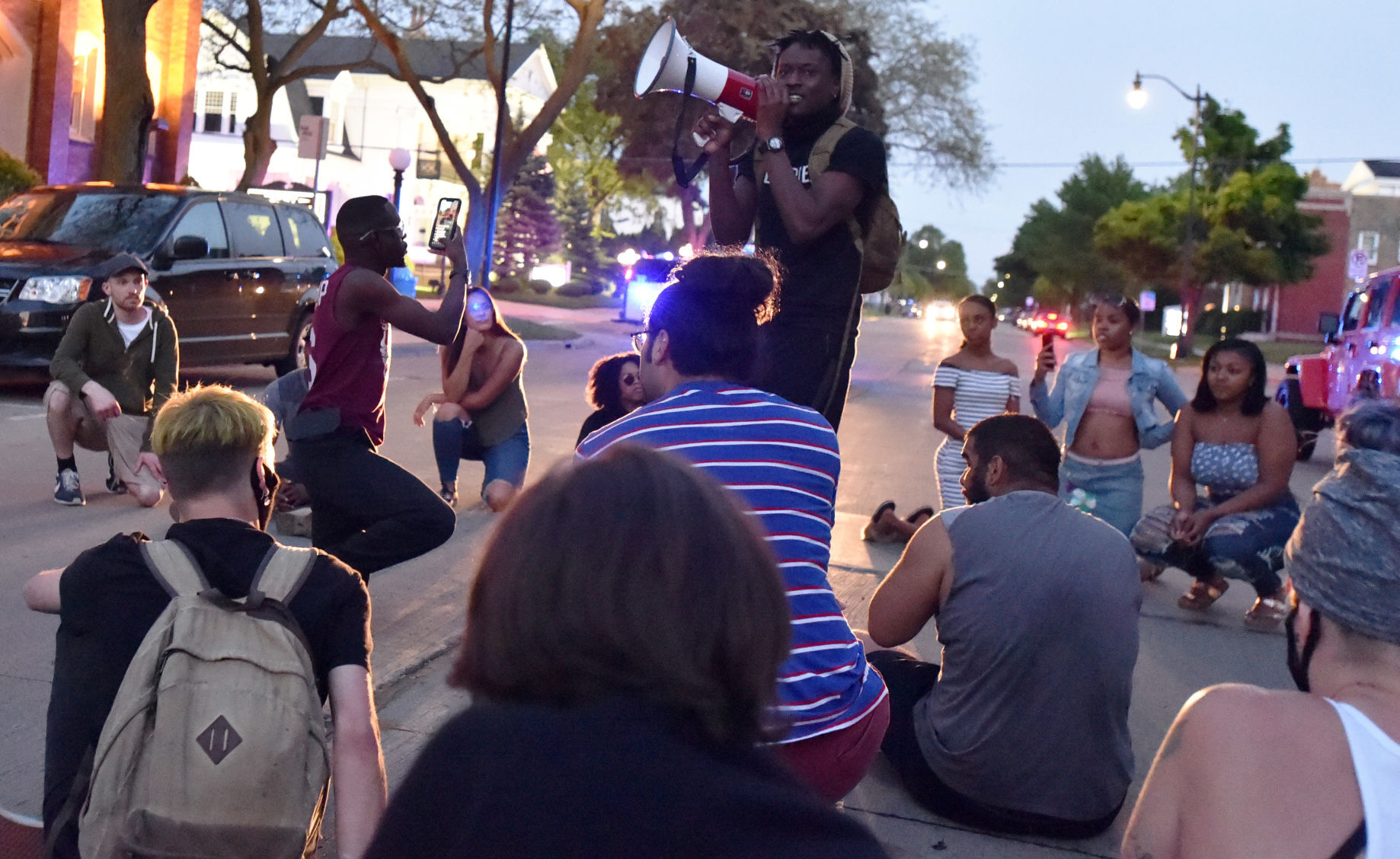 Taking a knee outside Racine County Jail